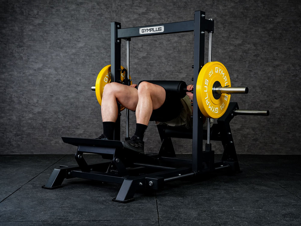 Gym Plus 3D Smith Hip Thrust Machine 3D-HT-01 a man performing hip thrust with yellow bumper plates