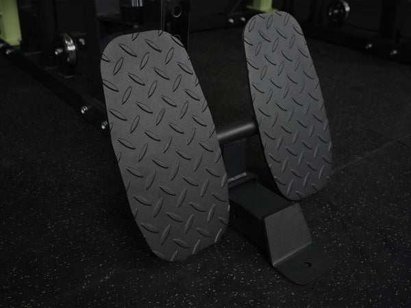 Gym Plus Icon Footrest Attachment FOOTREST-6070 footrest placed on gym flooring