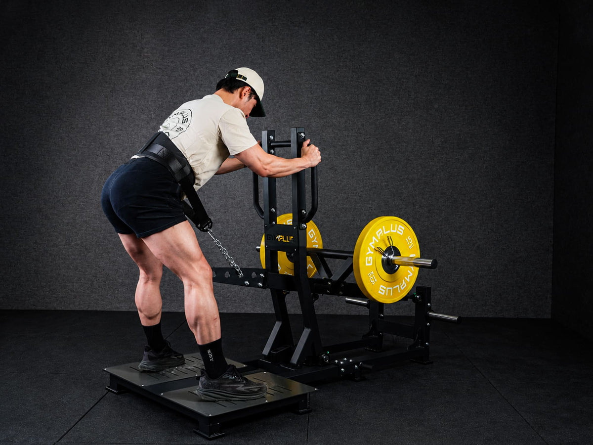 Gym Plus Belt Squat Machine - Plate Loaded BELT-SQUAT-01 a man performing belt squat while holding multi-angle handle