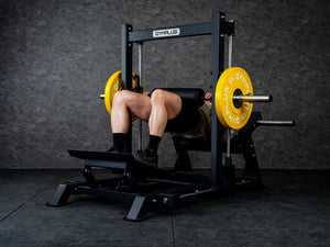 Gym Plus 3D Smith Hip Thrust Machine 3D-HT-01 a man performing hip thrust with yellow bumper plates