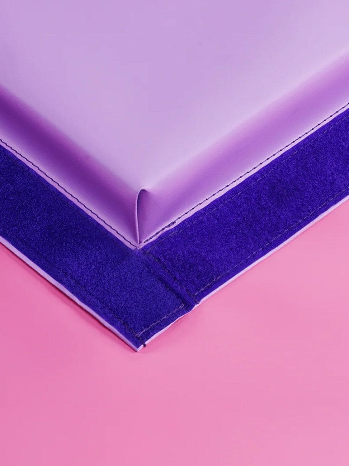 Closeup of the MEMAX Play Mats in purple and pink