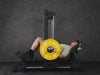 Gym Plus 3D Smith Hip Thrust Machine 3D-HT-01 a man performing hip thrust with yellow bumper plates